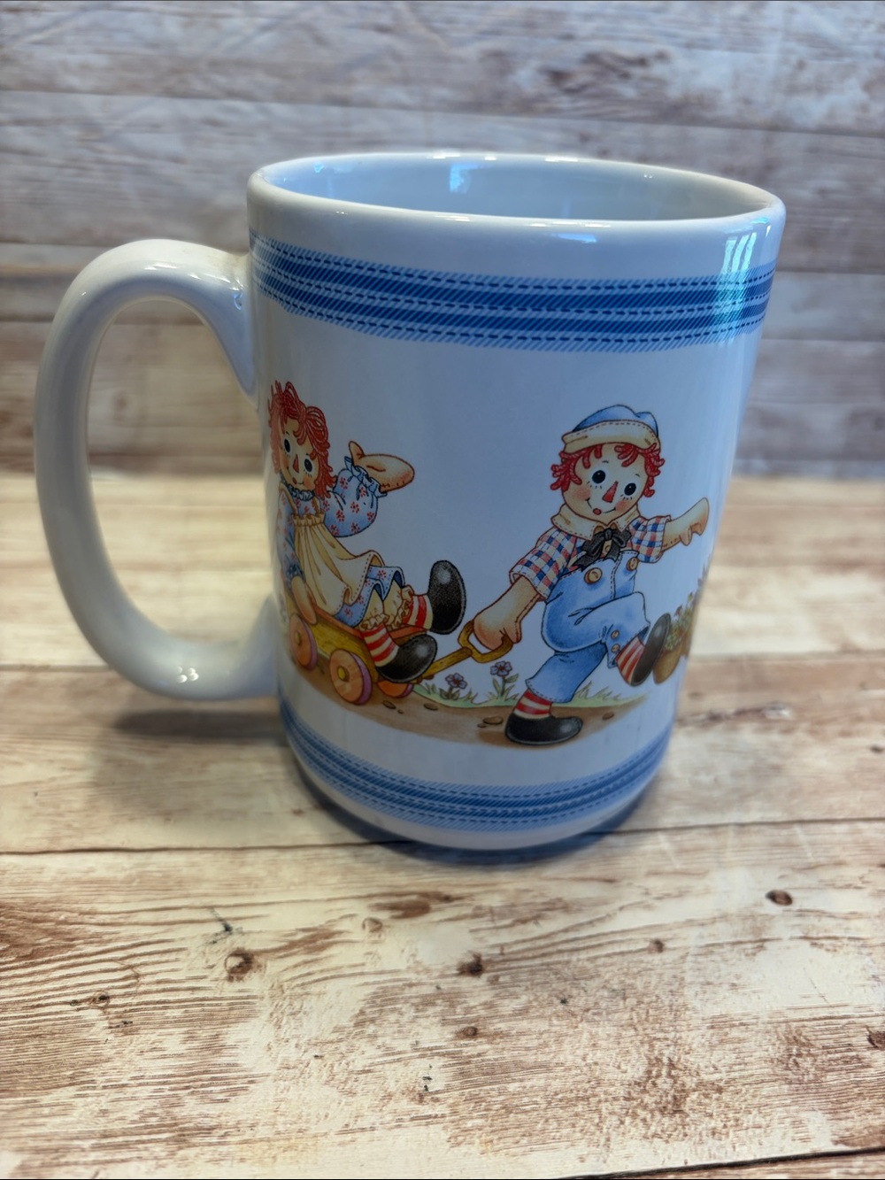 Vintage Raggedy Ann and Andy Ceramic Coffee Mug with Cartoon Illustration